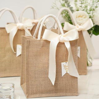 JollyFayre Small Burlap Gift Bags 10 Pack for Wedding Welcome, Bachelorette, Beach, Bridesmaid - Reusable Bulk Jute Bags with Cream Ribbons