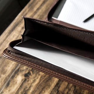 Cossini Premium Business Portfolio with Zipper – Padfolio - Superior Business Impressions Begin with PU Vegan Leather, 10.1 Inch Tablet Sleeve, Smart Storage, Solar Calculator, Writing Pad -Brown
