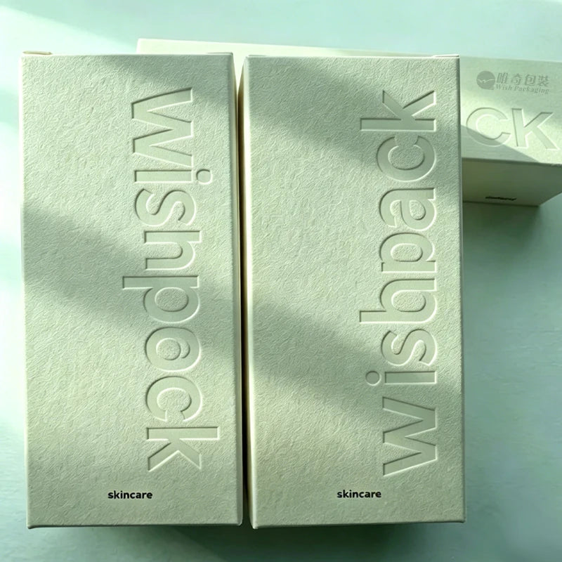 Custom-designed packaging boxes for small businesses featuring unique textured paper for skincare, perfume, and cosmetics