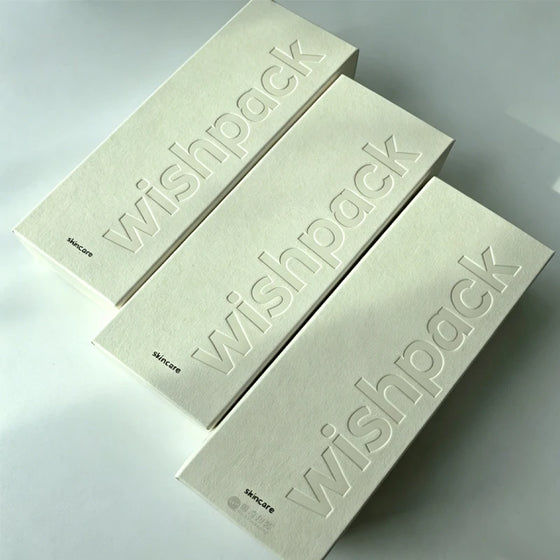 Custom-designed packaging boxes for small businesses featuring unique textured paper for skincare, perfume, and cosmetics